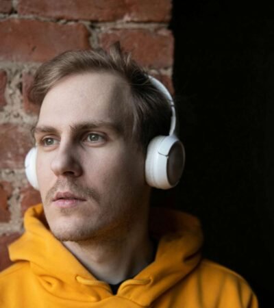 Customer Review Portrait Young Man in Yellow Hoodie